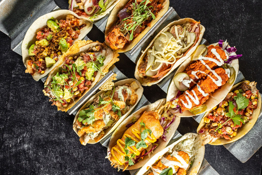 Velvet Tacos' row of tacos on a table